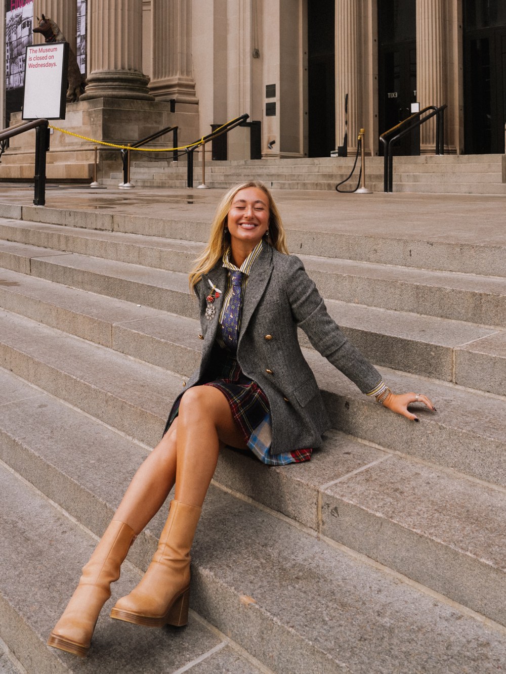 Tahlia Sisney, Co-Founder of Opusfolio, on the steps of The Met